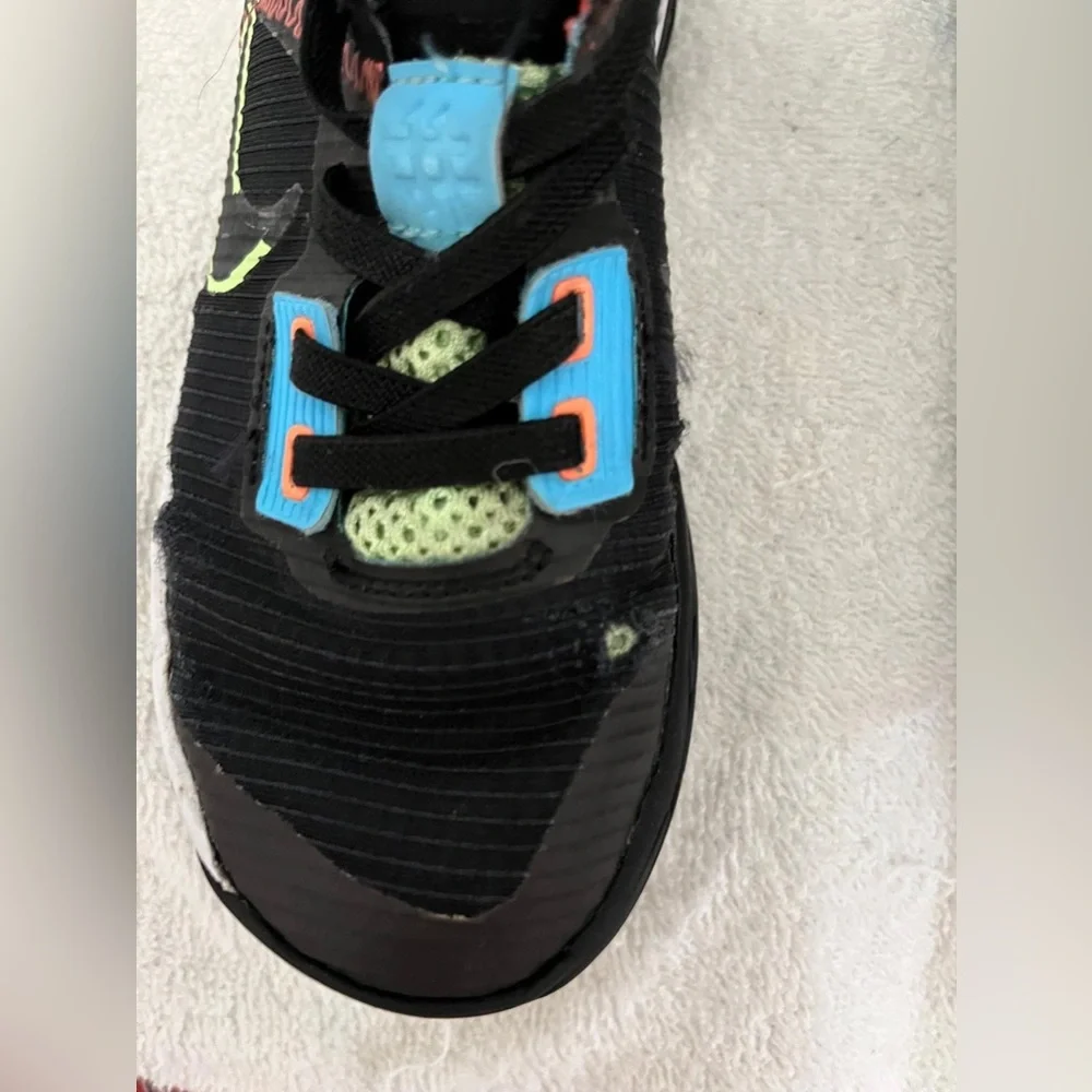(46) Nike Kids Black and Blue Athletic Shoes 13C